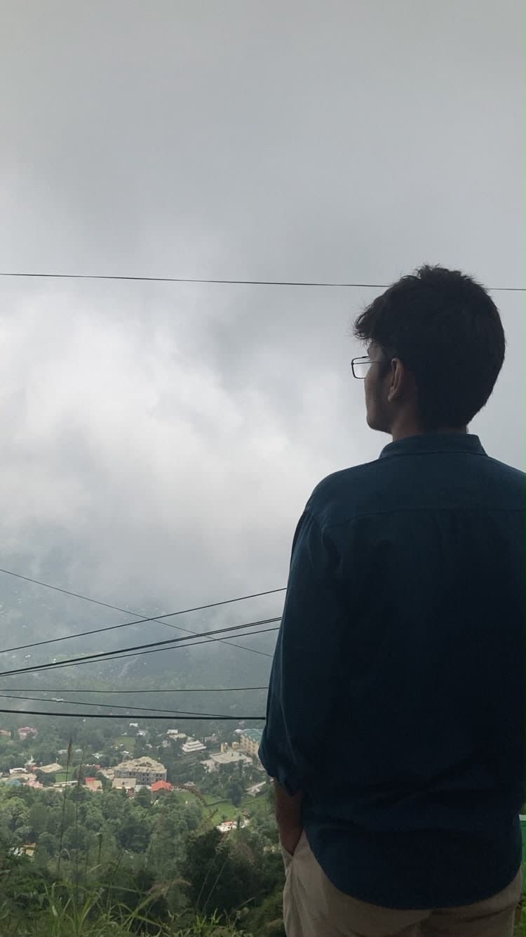 Muhammad looking out over a misty valley